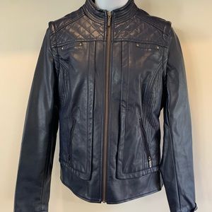 Women’s Tribal size 4 jacket.